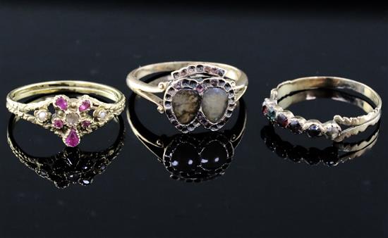 Three assorted Georgian gold and gem set dress rings including 15ct gold and a Regard ring.
